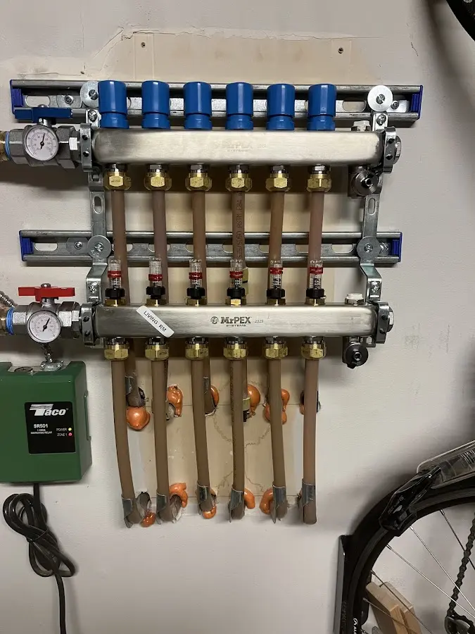 Plumber performing Leak Detection at a residential property in West Manchester